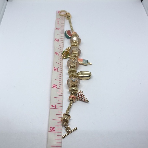Gold tone summer fun slider charm bracelet gold tone, costume jewelry. - Picture 3 of 3